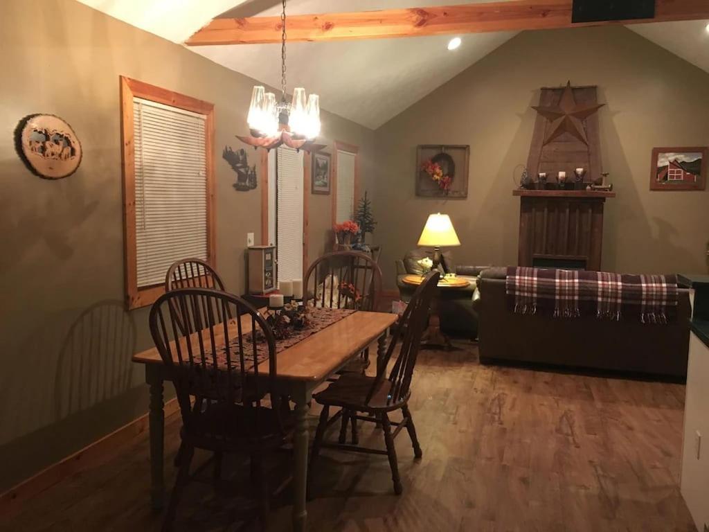 Gas Fireplace, Firepit, And Cedar Adirondack Chair Spencer Ngoại thất bức ảnh