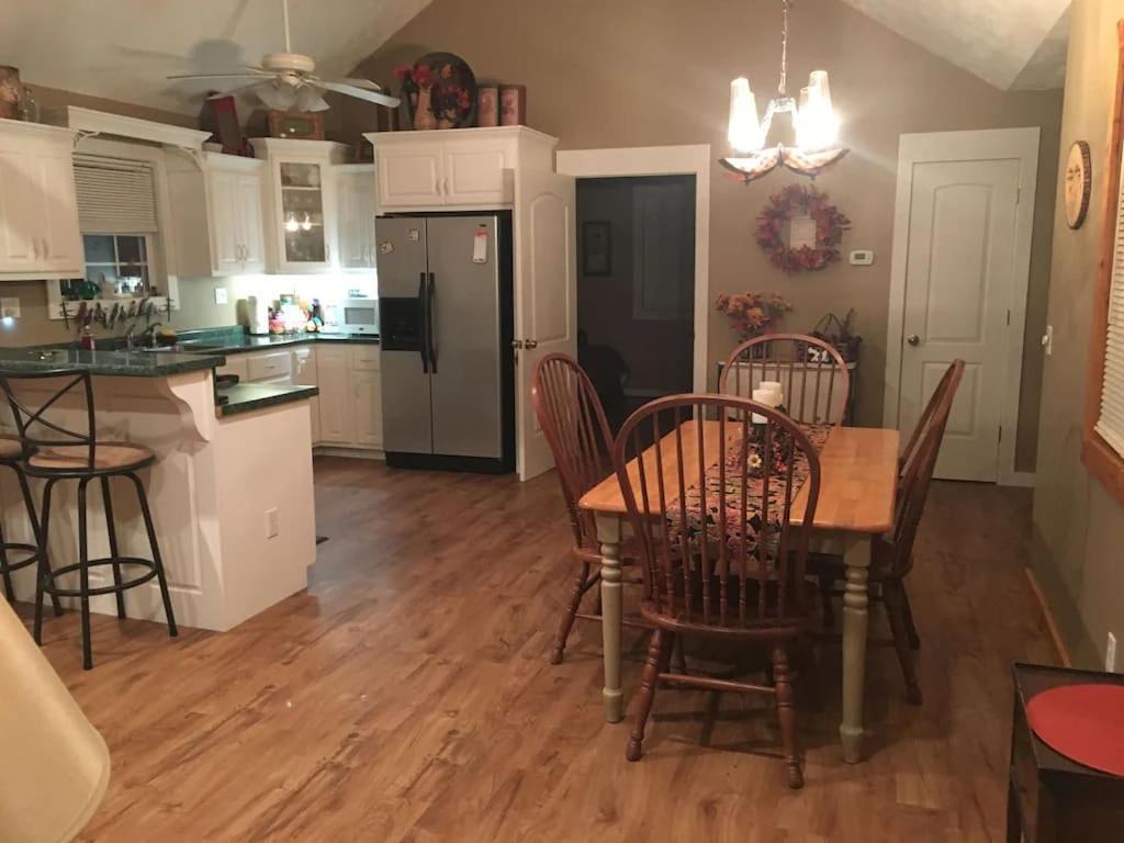 Gas Fireplace, Firepit, And Cedar Adirondack Chair Spencer Ngoại thất bức ảnh